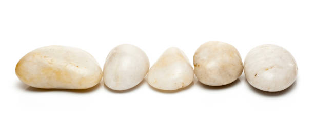istock Row of white river pebbles 483822245