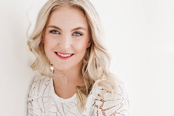 istock Beautiful happy young woman dressed in white 483822950