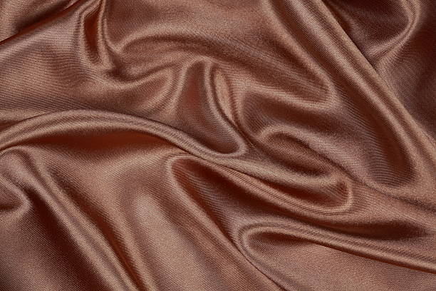 istock Brown silk texture satin velvet material 483823288