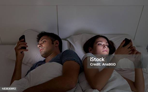 Mobile Phone Addiction Stock Photo - Download Image Now - Couple - Relationship, Routine, Addiction