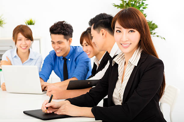 istock young business people working together at  meeting 483833042