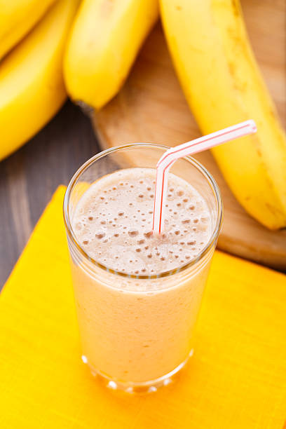 istock Glass of banana smoothie 483833313