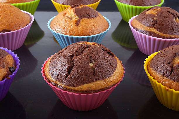 istock Freshly baked muffins on a roasting pan 483833488