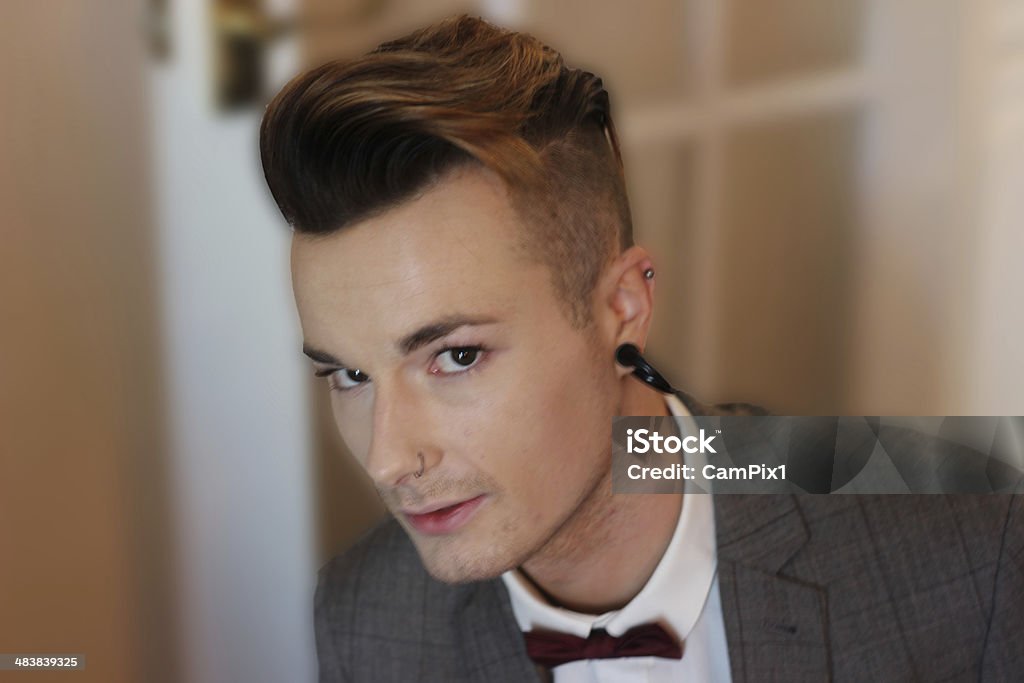 Model Man Young Male Man Looking into the Camera Lens with a slight smile Men Stock Photo