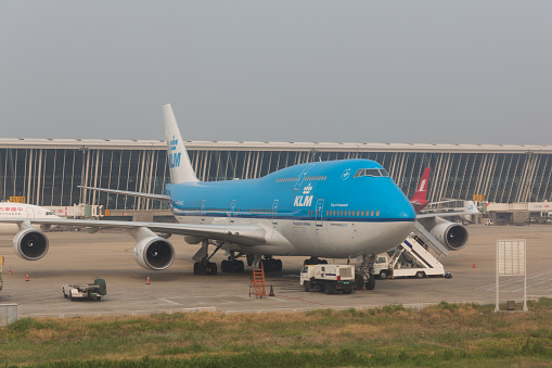 Shanghai, China - August 1, 2015: KLM Royal Dutch Airlines Boeing 747 at the Shanghai Pudong International Airport, China. 