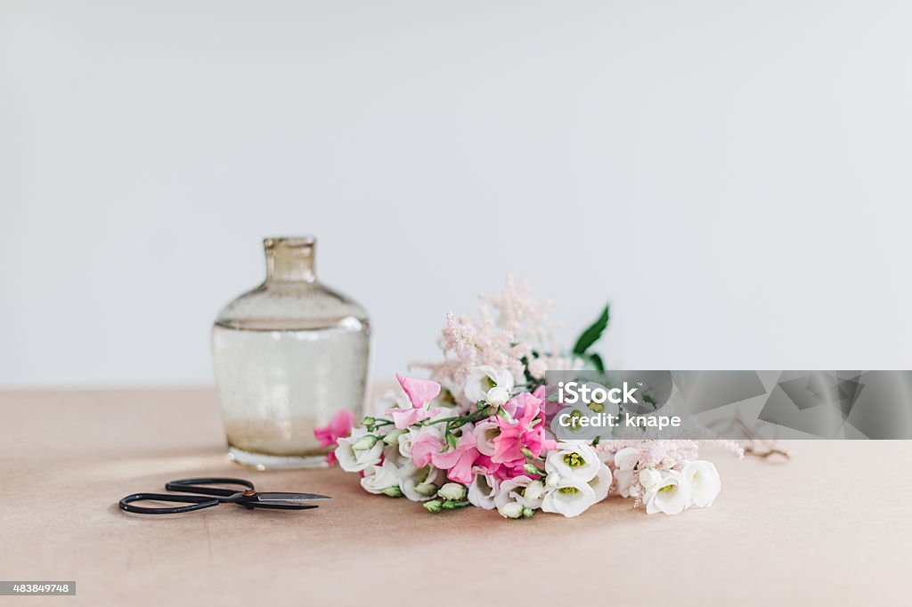 Flowers scissors and vase still life 2015 Stock Photo