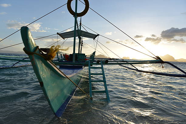 istock traditional banca outrigger boats in the philippines 483851240