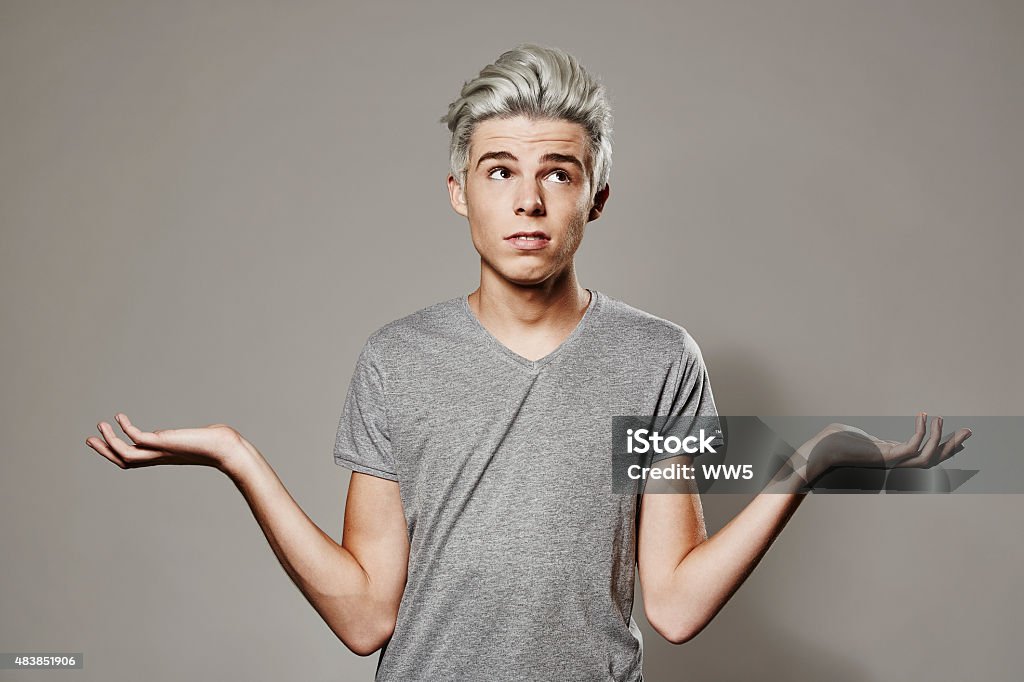 Boy having no idea White Hair Stock Photo