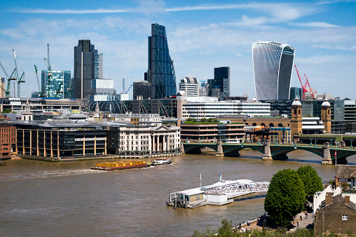 Some of the interesting buildings which appear on London’s skyline seen from the South Bank of the Thames, including ‘The Cheesegrater’, ‘The Walkie Talkie’ and Tower 42. Cannon Street Station is on the right, with Bankside Pier and the Globe Theatre on the south side of the river.