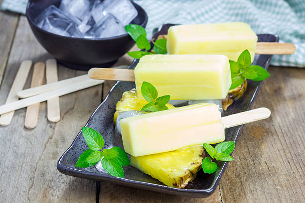 istock Homemade popsicles with pineapple and yogurt 483853278