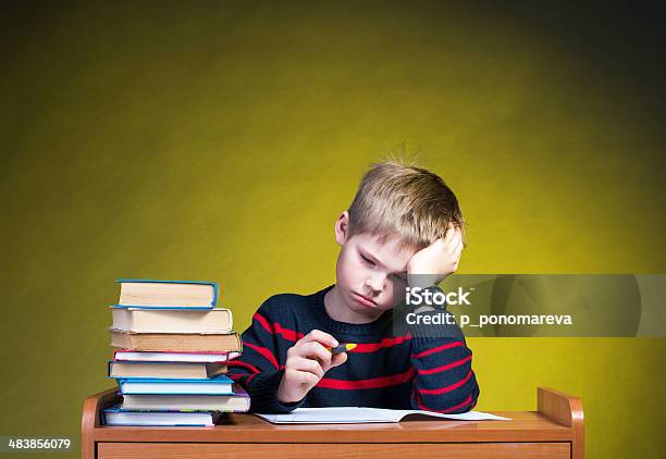 Child With Learning Difficulties Stock Photo - Download Image Now - Child, Reading, Struggle