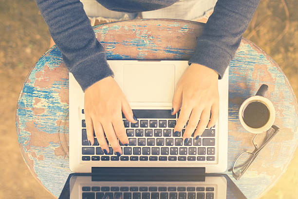 istock Girl working with a laptop 483857410
