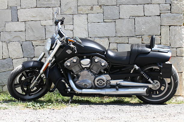 Harley Davidson İzmir, Turkey - April 6, 2014: Black customized Harley Davidson V-rod Motorcycle is parked on a country road near İzmir TURKEY harley davidson fat boy stock pictures, royalty-free photos & images