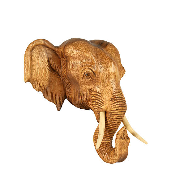 istock Sculpture (wood) picture elephant head. Isolated on pure white. 483859253