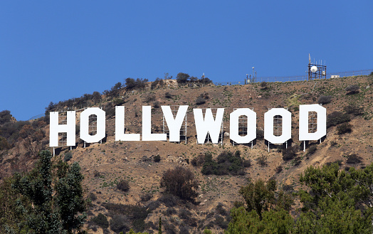 Los Angeles, California, USA – March 17, 2014: The Hollywood Sign located in the Hollywood Hills section of Los Angeles. Built originally as a real estate advertisement in 1923, The Hollywood Sign has since become a world famous landmark.