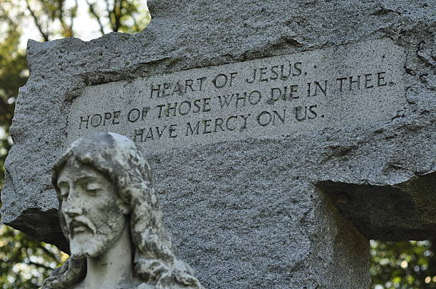 istock Religious Quote on Stone Jesus Christ Statue 483860366
