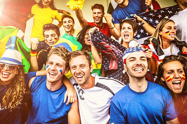 istock Multiple nations' fans at soccer stadium 483860427