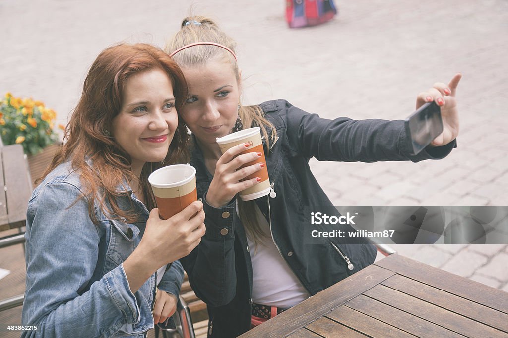 Girls Taking Pictures with Mobile Phone Adult Stock Photo