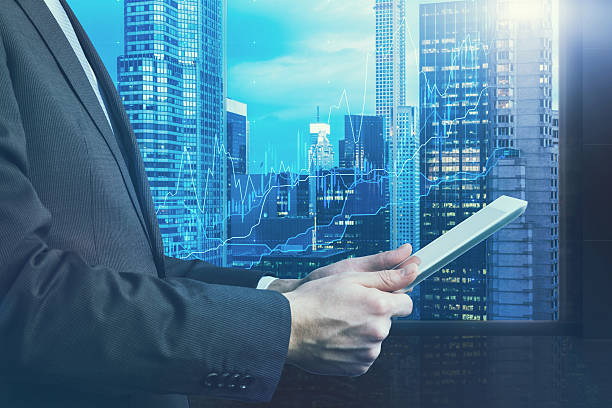 istock businessman who is browsing on his tablet. 483865304