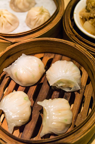 istock chinese Dimsum 'Hagao' in bamboo basket 483865444