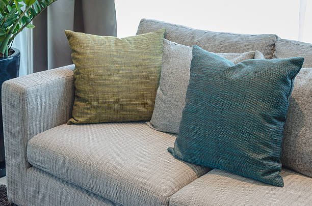 istock group of fabric pillows on fabric sofa in living room 483868410