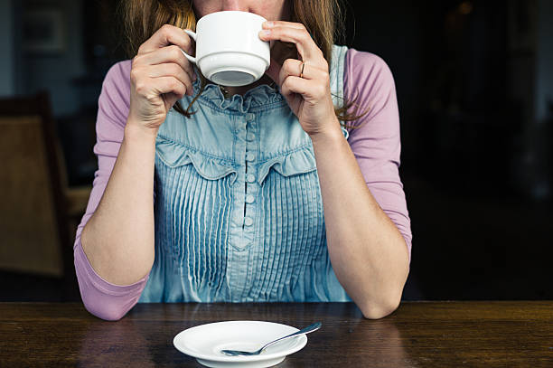 istock Woman having tea or coffee 483868928