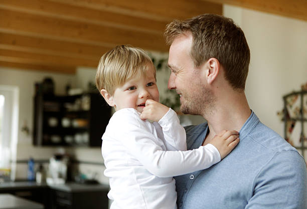 istock Father with son on the arm 483869250