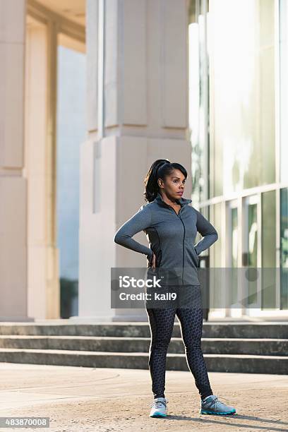 Mature Black Woman In Running Outfit Hands On Hips Stock Photo
