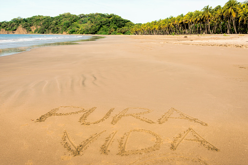 Pura Vida is a favorite Costa Rica expression. Here it is written in the sand of the beautiful Carrillo Beach in Guanacaste, Costa Rica