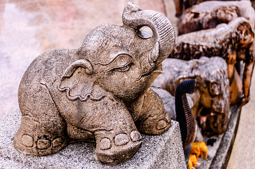Baby elephant statue at Buddhist shrine in Phuket, southern Thailand