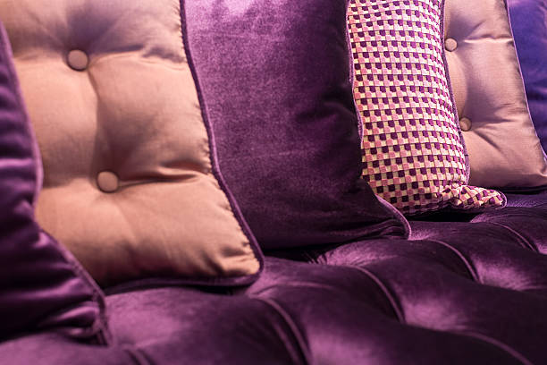 istock violet velvet sofa and cushions 483873786