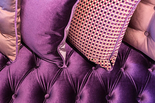 istock violet velvet sofa and cushions 483873788