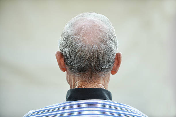 Head of an elder man Portrait of the back head of an elder man back of head photos stock pictures, royalty-free photos & images