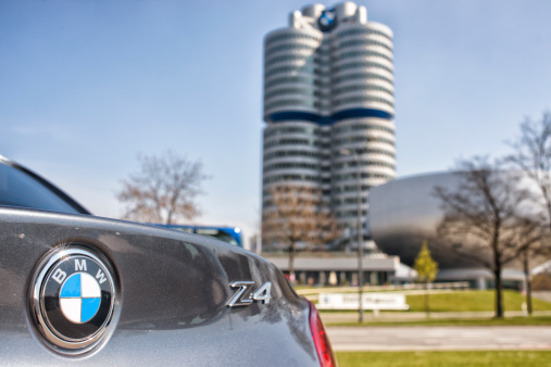 Munich, Germany - March 28, 2014: Detail of BMW Z4 . The BMW Z4 parked in front of the BMW Welt.BMW Z4 series car is a sports car produced by the German car manufacturer BMW. It was introduced in 2013 . BMW (Bayerische Motorenwerke AG) is a german automobile manufacturing company based in Munich, Bavaria.In the background you see the Headquarter of BMW and the BMW Museum.