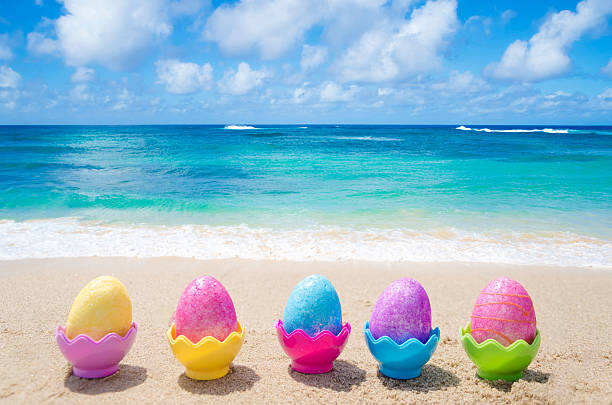 Easter eggs on the beach stock photo