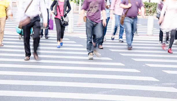 istock People walking on big city street 483875499