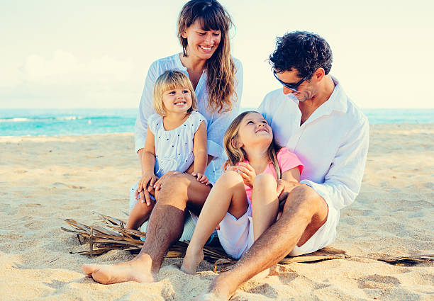 istock Happy Family at the Beach 483875877