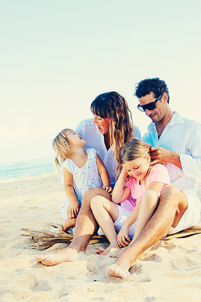 istock Happy Family at the Beach 483875881