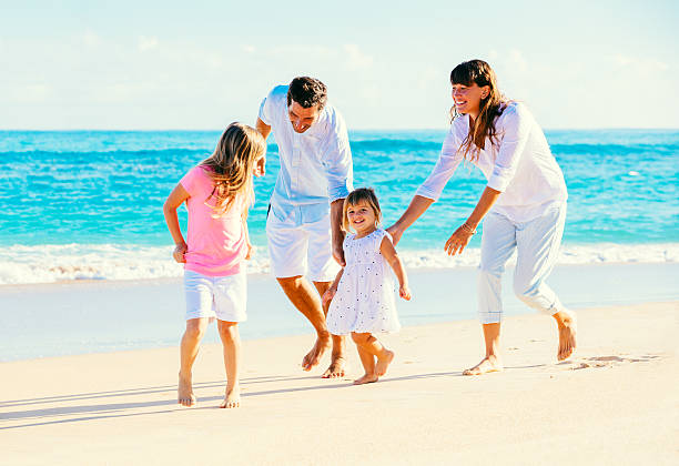 istock Happy Family on the Beach 483875927