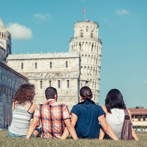istock Four Friends on Vacation Visiting Pisa 483877149