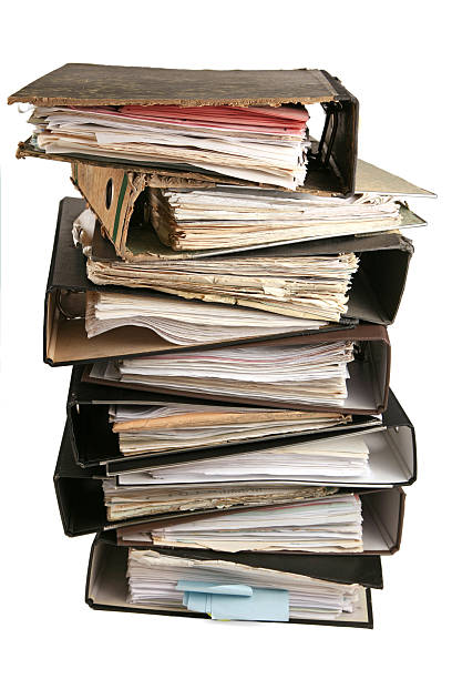 Very old files A stack of very old files. old file folder stock pictures, royalty-free photos & images