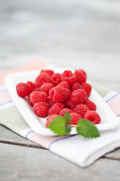 istock Germany,Close up of raspberry plate on napkin 483879086