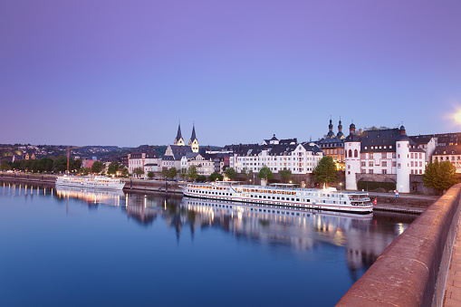 Koblenz ,View from Balduin bridge of old town with churches and old castle,cruise ships river Moselle