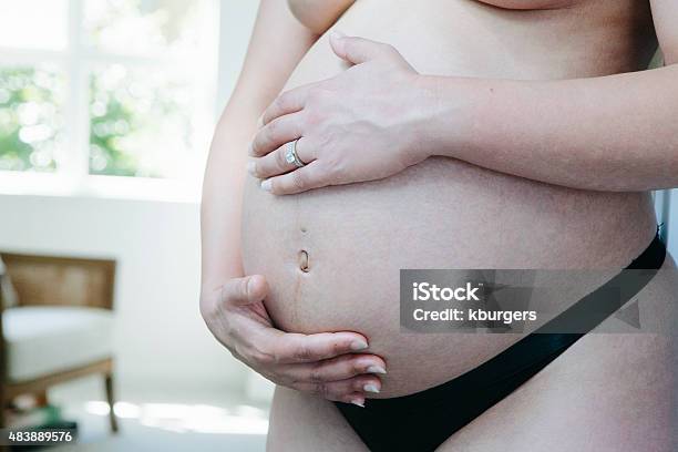 Pregnant Woman Stock Photo - Download Image Now - 2015, Adult, Adults Only