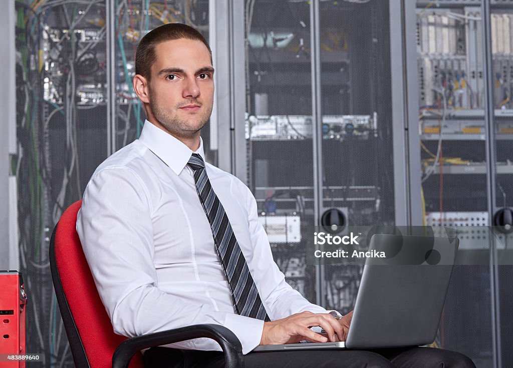 modern datacenter server room business man engeneer in modern datacenter server room 2015 Stock Photo