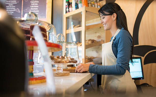 istock Woman working at a cafe 483890378