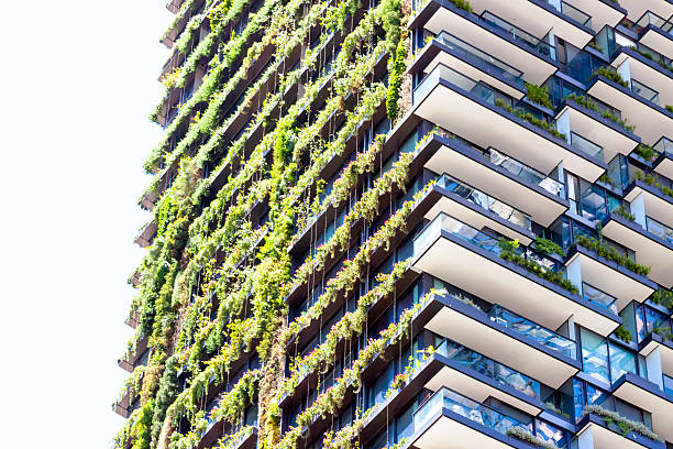 istock Vertical garden on high rise residental building, copy space 483891176