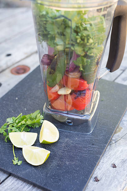 istock Salsa ingredients in blender with lime and cilantro 483895820