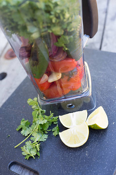 istock Salsa ingredients in blender with lime and cilantro 483895822