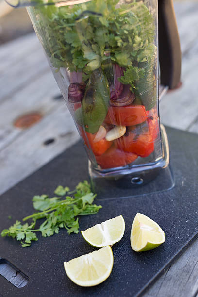 istock Salsa ingredients in blender with lime and cilantro 483895836